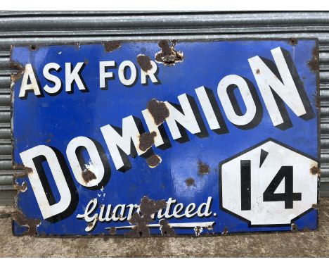 A Dominion Guaranteed rectangular enamel sign, 48 x 30".