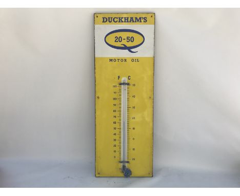 A Duckham's 20-50 Motor oil enamel thermometer, in good condition, 13 x 36". 