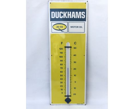 A Duckhams 20-50 Motor Oil enamel thermometer by Burnham, 13 x 36". 