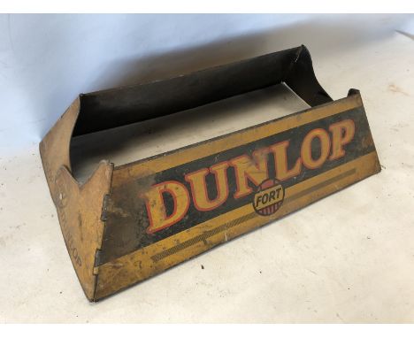 A Dunlop forecourt tyre display rack.