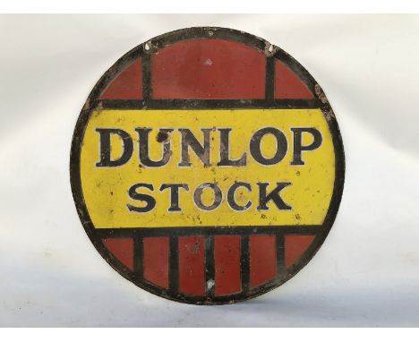A Dunlop Stock circular double sided enamel sign, 24" diameter.