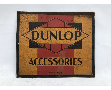 A Dunlop Accessories rectangular tin sign.