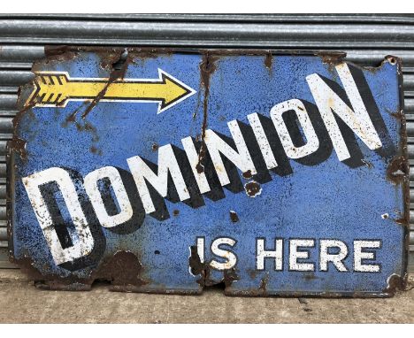 A 'Dominion is Here' rectangular enamel sign, 48 x 30".
