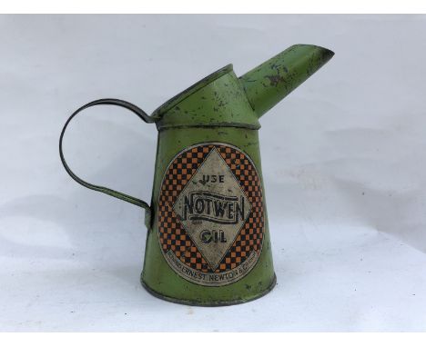 A Notwen Oil pint oil measure with unusual light green colour.