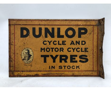 An early Dunlop Cycle and Motor Cycle Tyres double sided tin advertising sign of good colour with hanging flange, with J.B. D