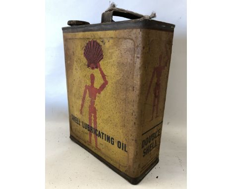 A Shell Lubricating Oil 'robot-man' gallon can.