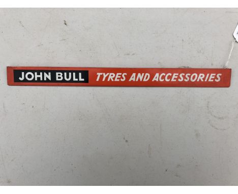 A John Bull Tyres and Accessories shelf strip.