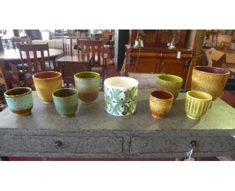 A collection of Poole Pottery vases, (9) 