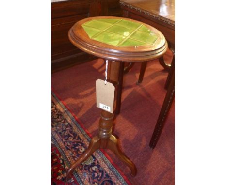 A Victorian Arts and Crafts walnut torchere/plant stand on tripod base 