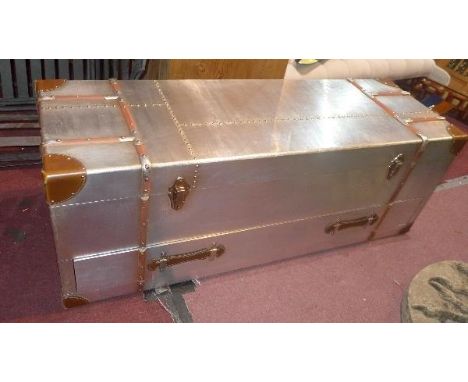 An Andrew Martin style aviator trunk, H.44 W.121 D.40cm 
