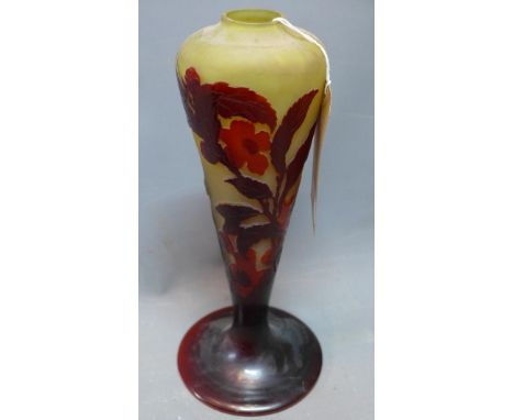 A slender Galle cameo lamp base with deep red hues on a warm yellow background, flowers sprout from the base of the lamp, H.3