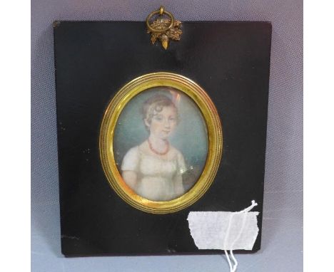 A 19th century miniature painted portrait of Elizabeth Naylor in brass mounted ebonised frame, 7 x 5.5cm 