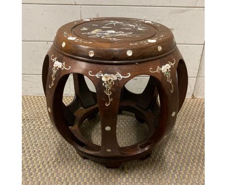 A vintage Chinese barrel shaped drum stool with mother of pearl inlay 