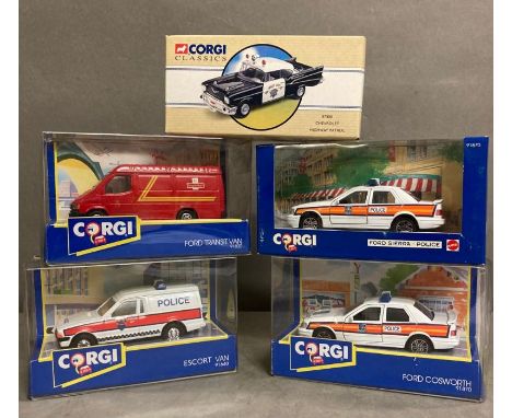 A selection of five Corgi Diecast model cars to include police cars and a Royal Mail van 