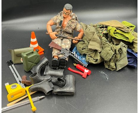 An Action Man with various uniforms 