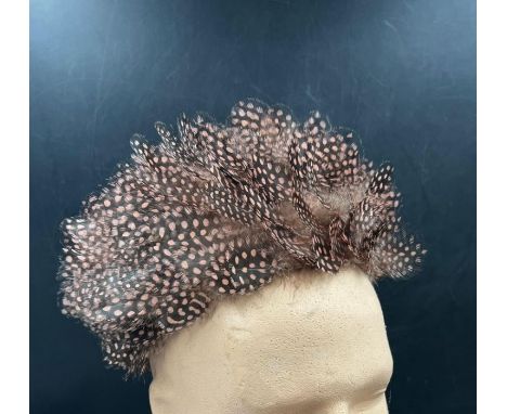 A vintage feather hat 