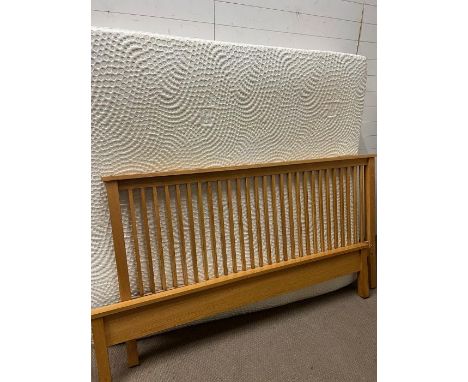 A light oak 6ft bed frame and Sealy mattress 