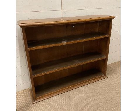 An oak two shelf bookcase (H93cm W110cm D26cm)