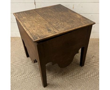 An oak ceramic lined commode 