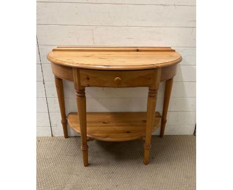 A Ducal pine demi lune single drawer side table with shelf under \9H70cm W90cm D46cm)