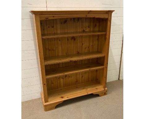 A Ducal pine three shelf bookcase