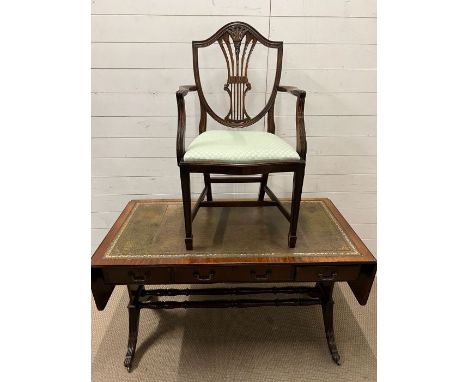 A sofa table with green leather top and twin stretchers on down swept legs and a chair (H74cm W130cm D64cm)