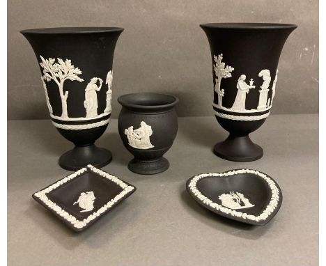 A selection of black and white Wedgewood Jasperware to include pin dishes, a pot and two vases 