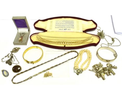 A COLLECTION OF VINTAGE JEWELLERY To include a marked 9ct crucifix necklace weight 2g.  Silver and white metal charm bracelet