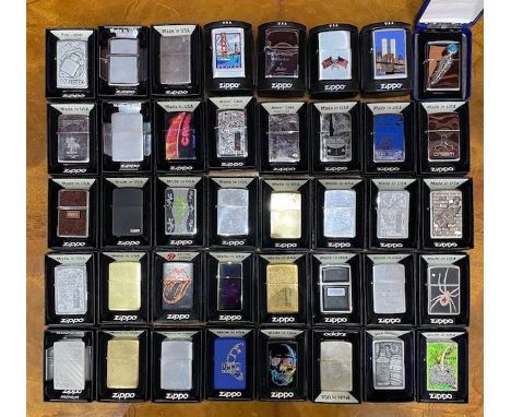 Box of Zippo Lighters, 40 in total, some rare and limited editions.