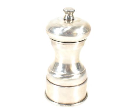 A silver hallmarked table condiment pepperette. Hallmarked London 1997 by David R Mills.Measures 11cm high. Weight 174g