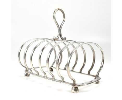 A Victorian 19th century hallmarked silver toast rack. Hallmarked London 1889, sponsors mark for Henry Wilkinson &amp; Co (Jo