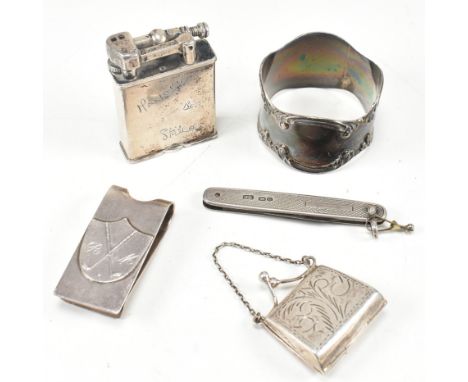 A collection of hallmarked silver to include a London hallmarked Parker Beacon silver cigarette lighter, hallmarked silver fr