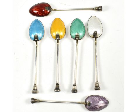 A hallmarked silver cased set of enamel backed silver spoons. Multiple coloured backs with finial end handles. Hallmarked Bir