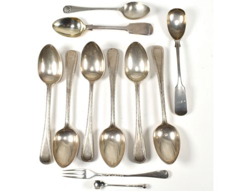A hallmarked set of 6 silver teaspoons. Hallmarked London 1874, sponsors mark GA for George Aldwinckle. . Together with three