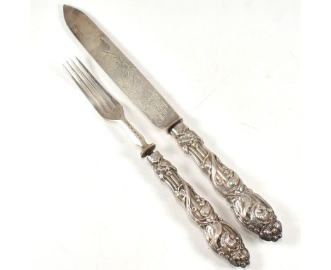 Victorian 19th century hallmarked silver cased serving knife and fork. Hallmarked Birmingham 1860, sponsors mark for John Gil