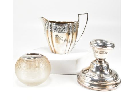 A Victorian hallmarked silver creamer jug. Hallmarked London, date letter and sponsors mark partially rubbed. Together with a