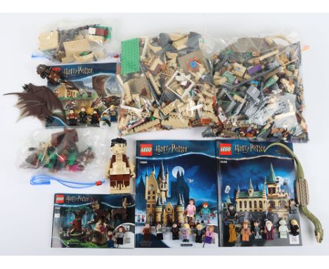 Four Harry Potter loose Lego Sets Some retired. Including, Hungarian Horntail #75946 with instructions, Astronomy Tower #7596