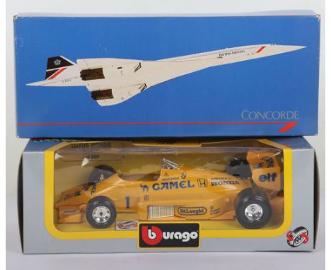 Two Boxed Diecast Vehicles. Including Burago F1 Lotus 97 Turbo Camel Ayrton Senna 1:24 scale car boxed and British Airways Co