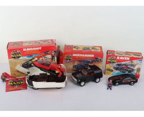 Three Vintage M.A.S.K. Mask Kenner Boxed vehicles with Action Figures.  Including a complete boxed Slingshot, Complete boxed 