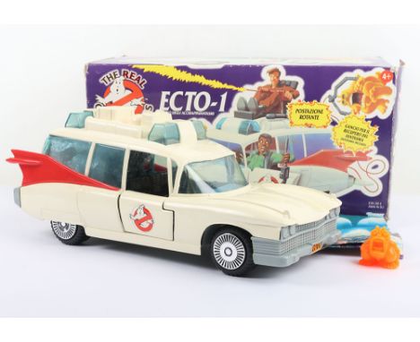 Vintage Ghostbusters Ecto-1 Vehicle boxed Kenner. Complete with Instructions and ghost. Some Yellowing to the car, Unbroken t