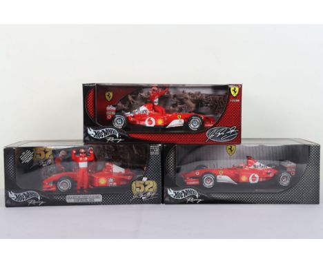 Three Hot Wheels Racing Ferrari Formula One 1:18 Scale Model Cars. Including F-2002 Michael Schumacher, World Champion Michae