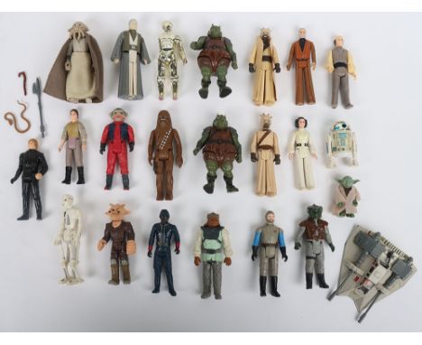 Twenty Two Vintage Star Wars Action Figures loose Kenner. Some original weapons and accessories. Play wear to good condition.
