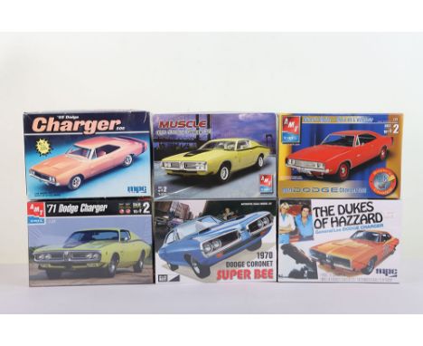 Six Model Car kits 1:25 Scale AMT Ertl, MPC Ertl all new in box.  Including The Dukes of Hazzard Dodge Charger, 1969 Dodge Ch