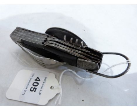 A penknife, the twelve tools to include a spoon and fork