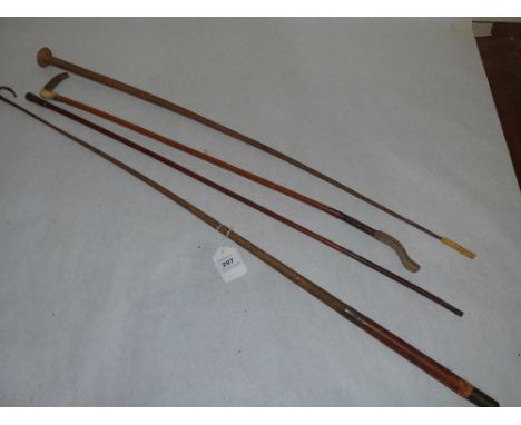 Three whips and a swagger stick