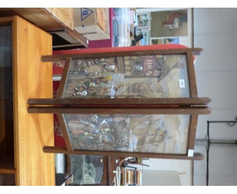A 1920s oak and watercolour panel diptych firescreen 31' high 
