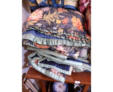 Two pairs of blue floral silk curtains and accessories