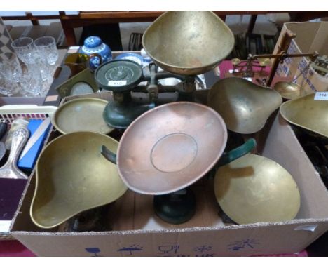 Four sets of weighing scales