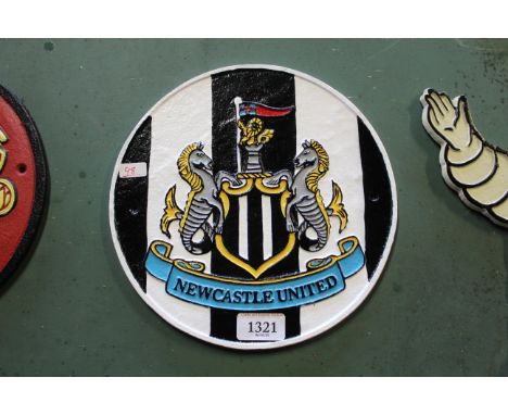 A circular painted cast iron plaque for Newcastle United Football Club (98)