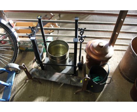 A fireside companion stand with four tools; coal bucket; a pair of wrought iron fire dogs etc.